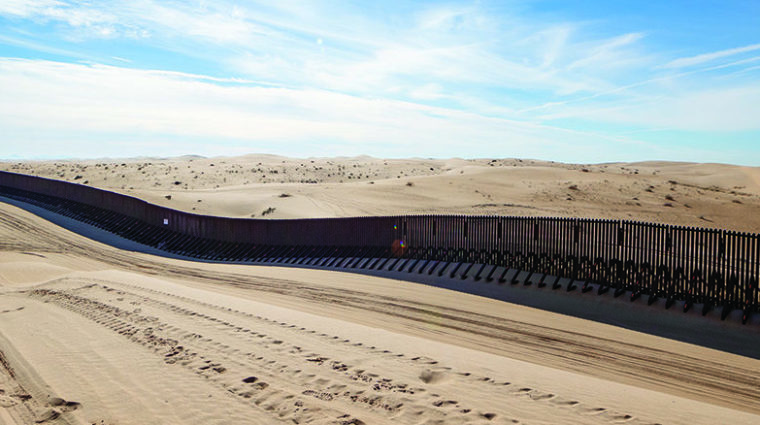 Border Wall In The Imperial Sand Dunes, 20 Miles West Of Yuma, A